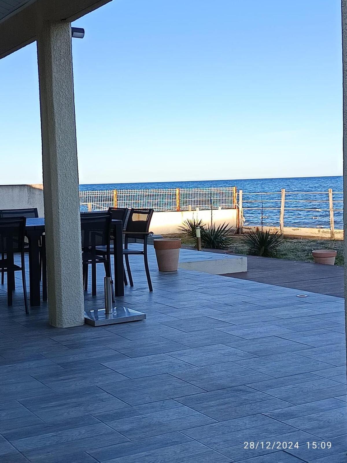 Bord de mer, pieds dans l'eau, vue panoramique Villa San-Nicolao Esterno foto